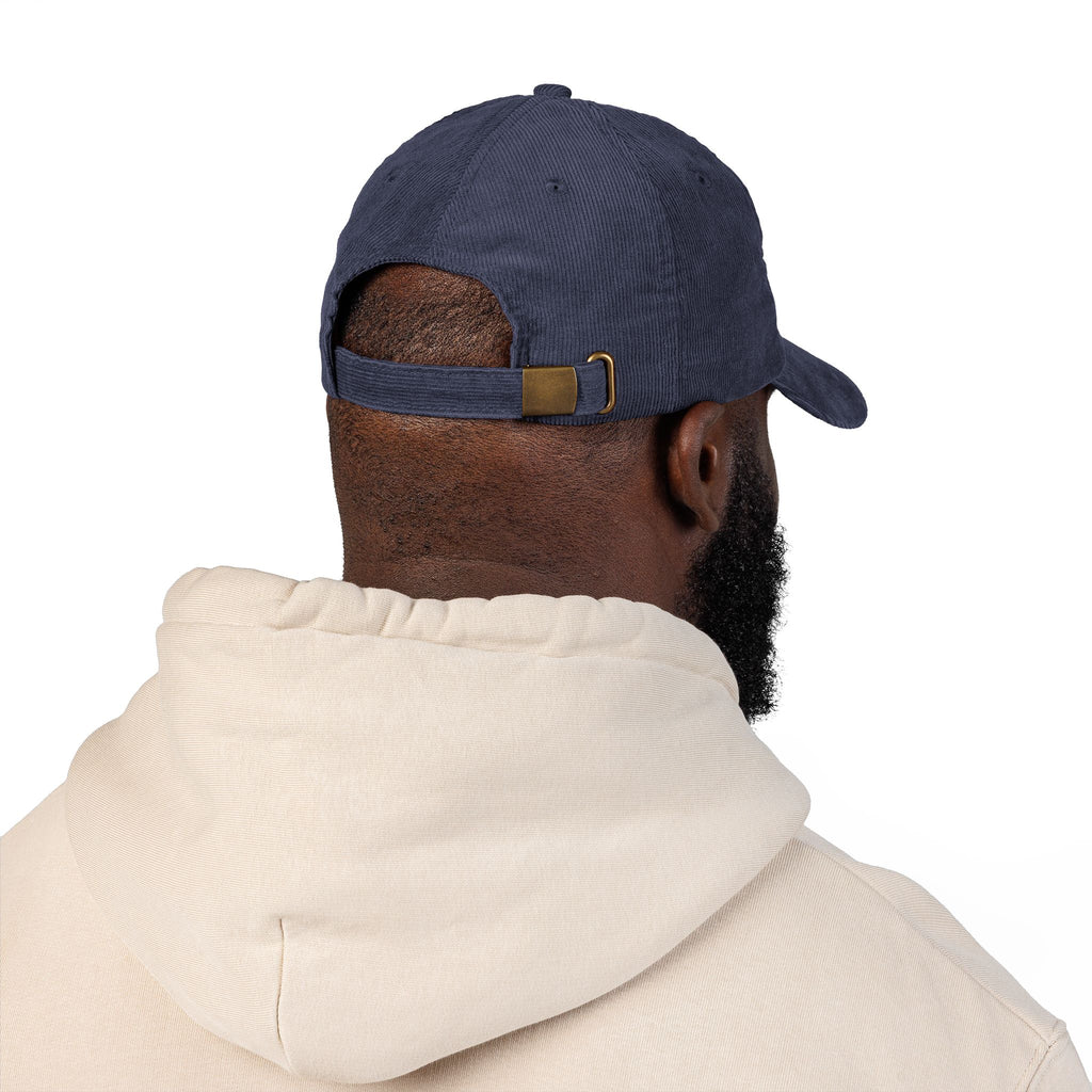 Blue hand holding orange planet embroidered corduroy cap, Dooky Squad