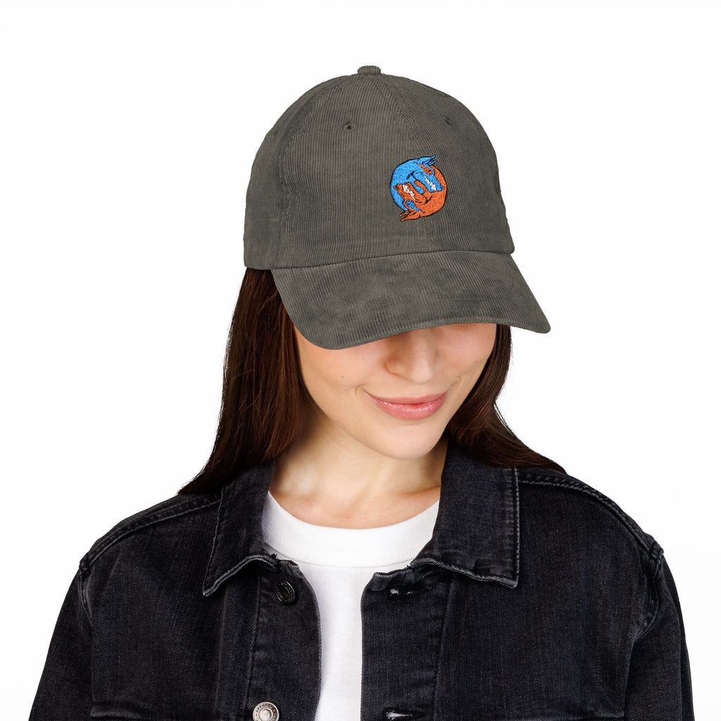 Blue hand holding orange planet embroidered corduroy cap, Dooky Squad