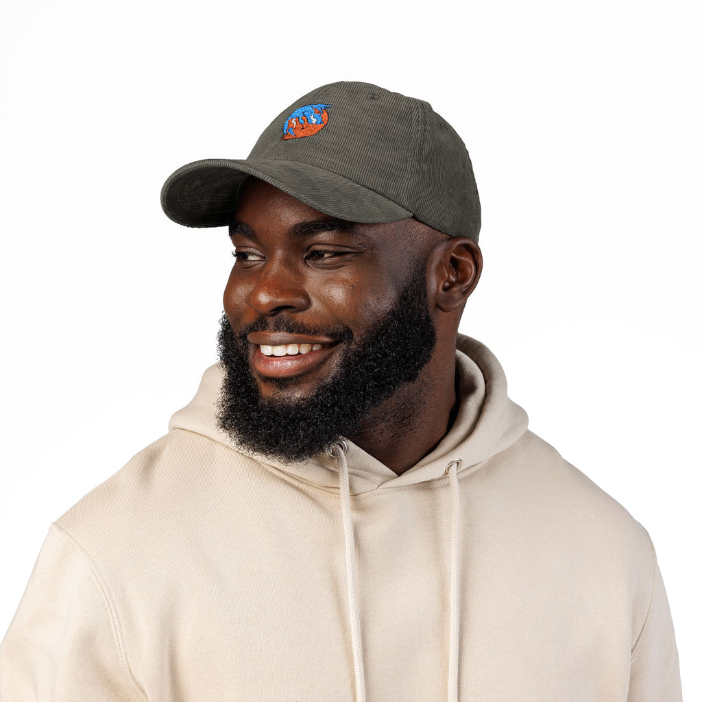 Blue hand holding orange planet embroidered corduroy cap, Dooky Squad