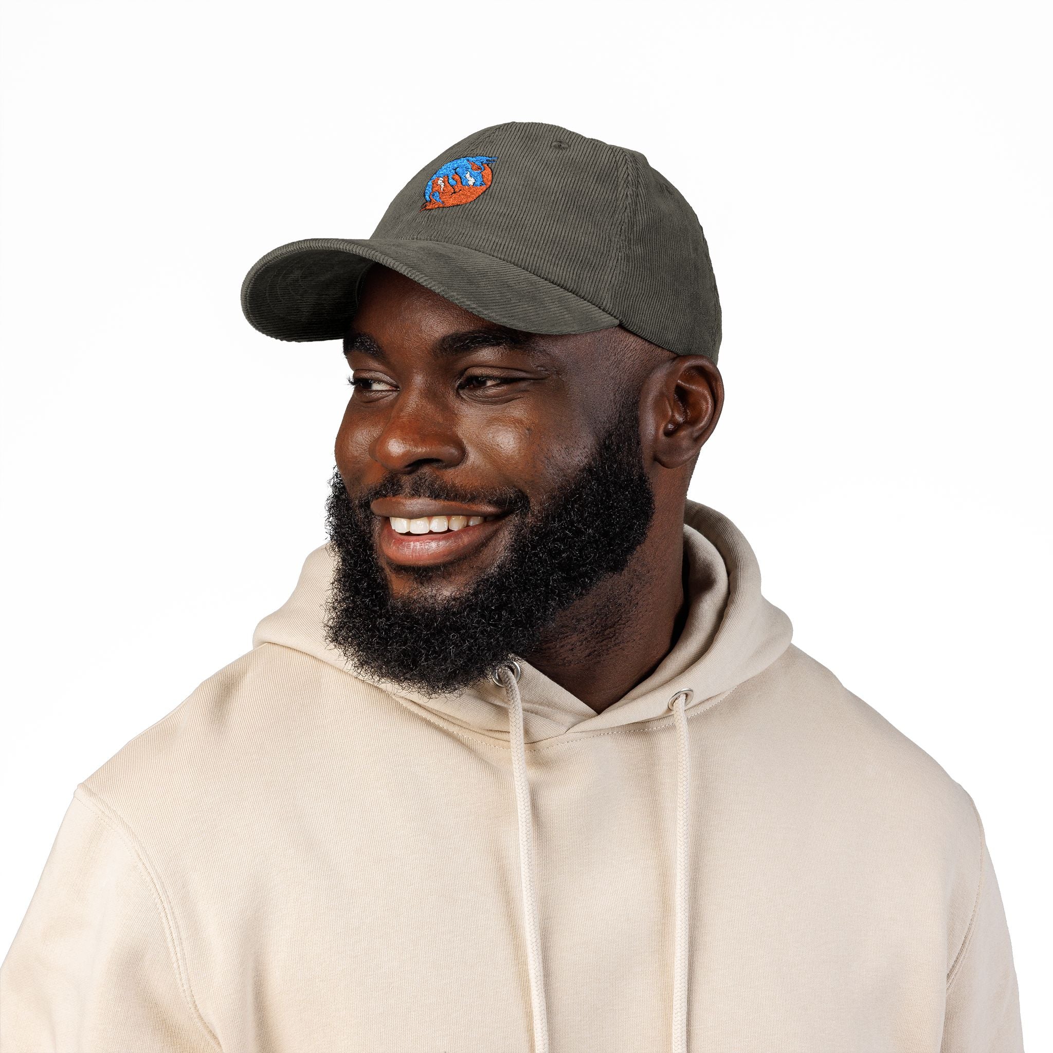 Blue hand holding orange planet embroidered corduroy cap, Dooky Squad