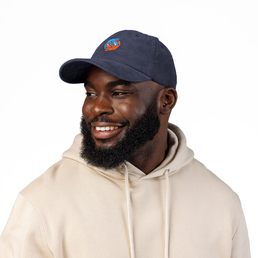 Blue hand holding orange planet embroidered corduroy cap, Dooky Squad