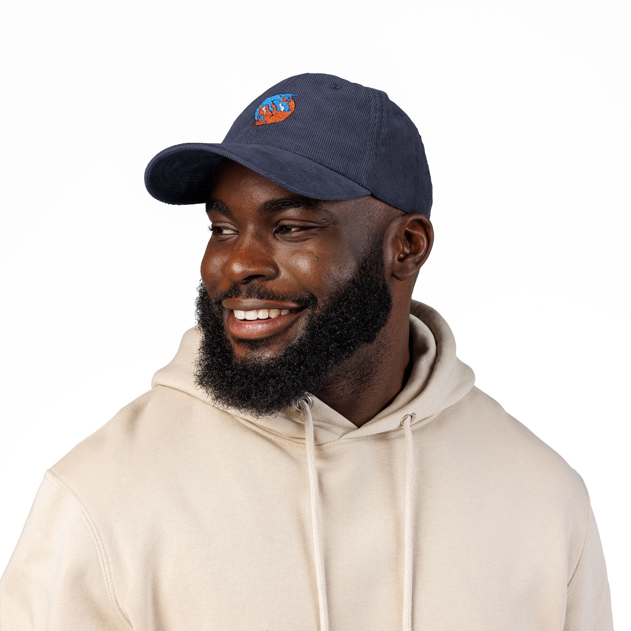 Blue hand holding orange planet embroidered corduroy cap, Dooky Squad