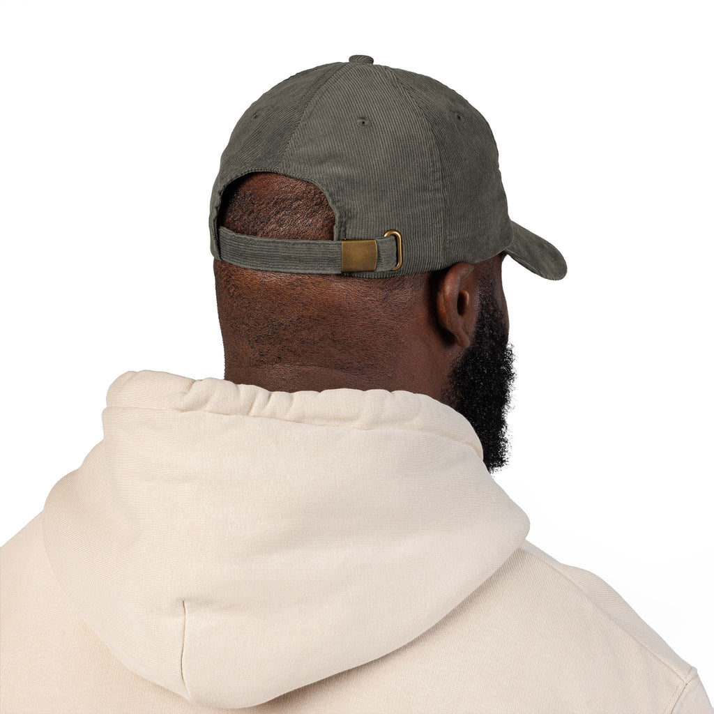 Blue hand holding orange planet embroidered corduroy cap, Dooky Squad